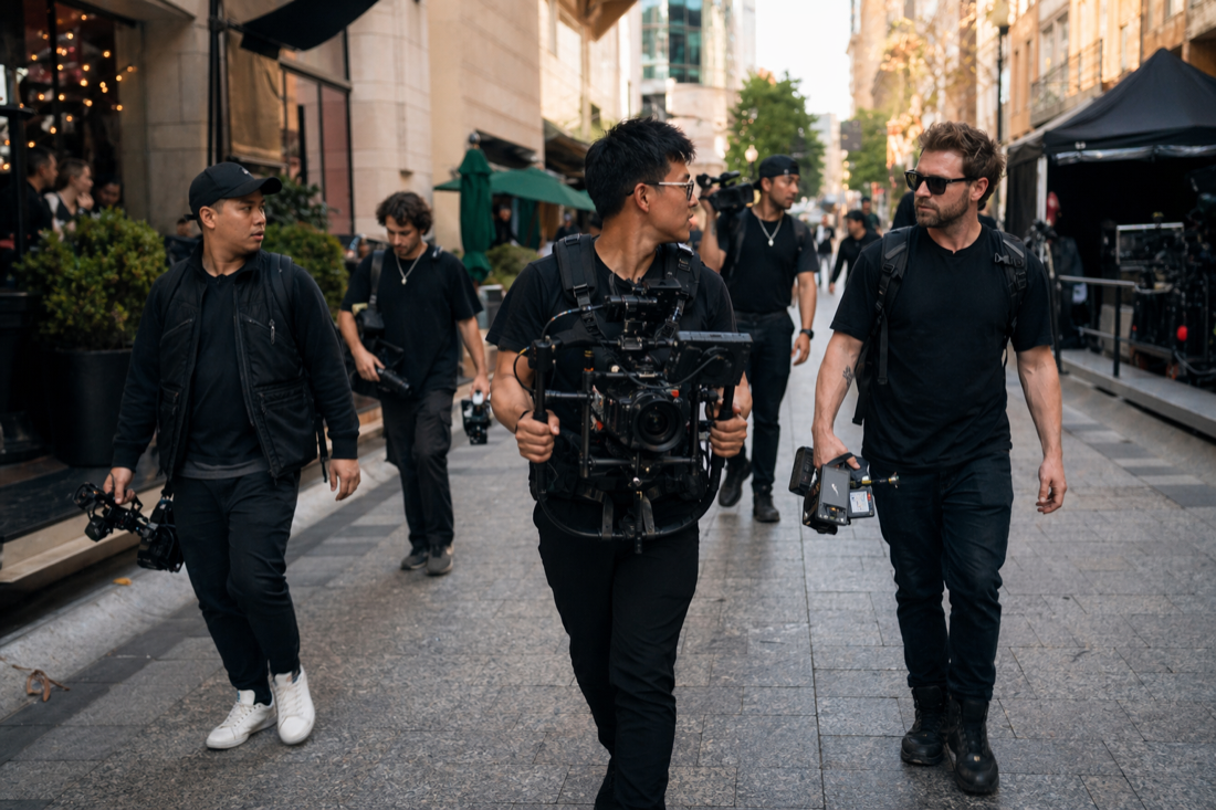 Vivid Canvas production crew filming a premium event